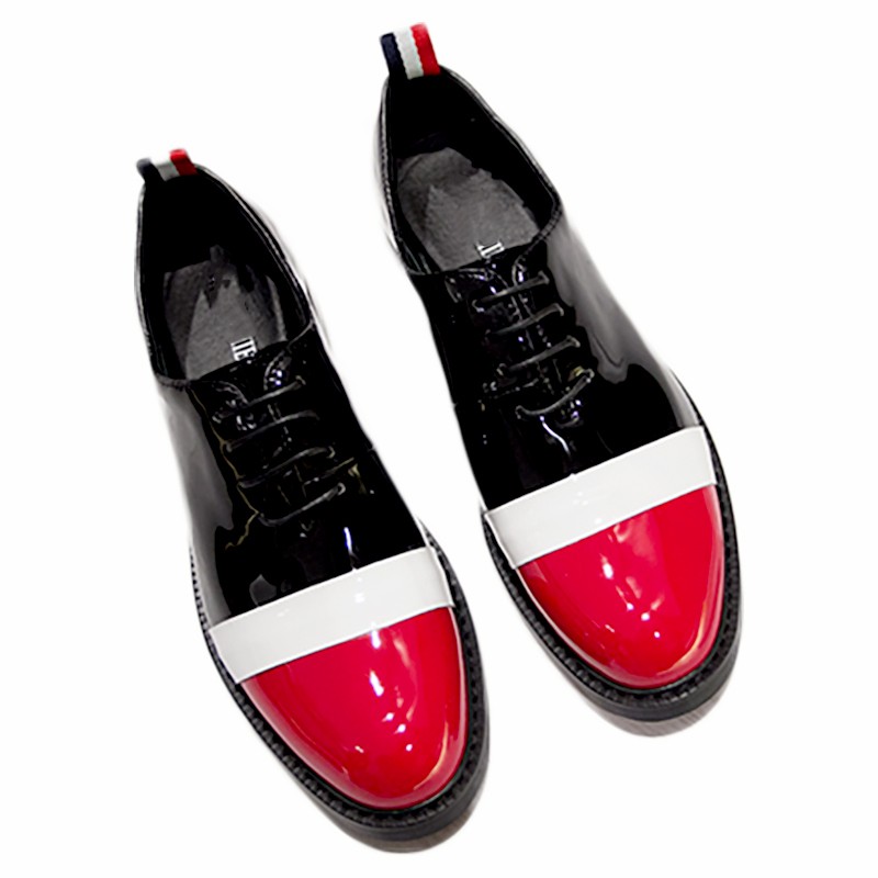 Red and black burnished all leather luxury lace up dress shoe for men. With  orange red bottom. Comfortable, soft leather. Made in Italy. Available in  size 7-14. It can be custom made