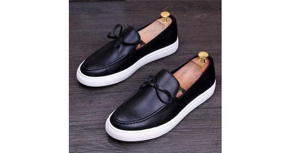 black casual shoes with white sole