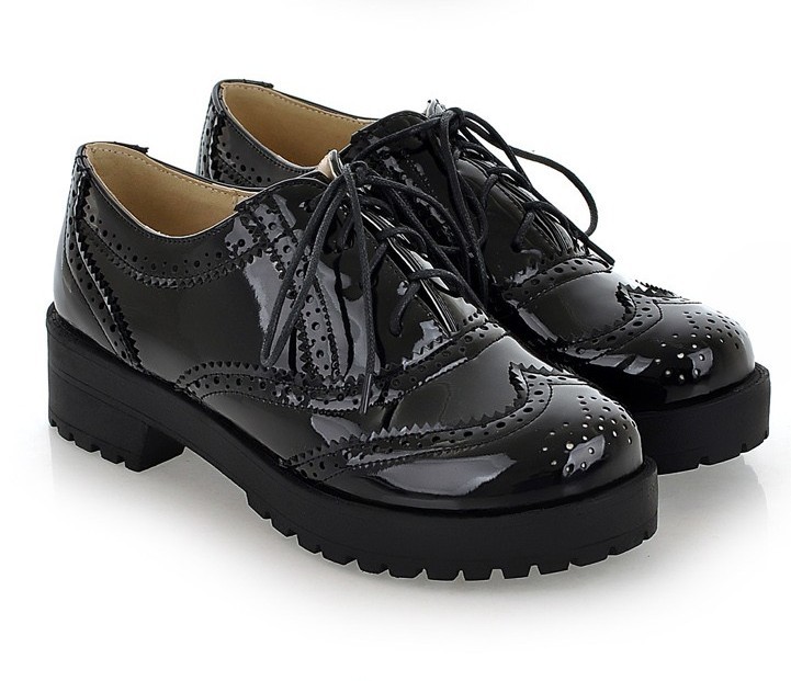 black patent leather wingtip shoes