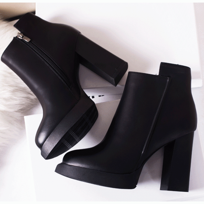 black platform heel ankle boots