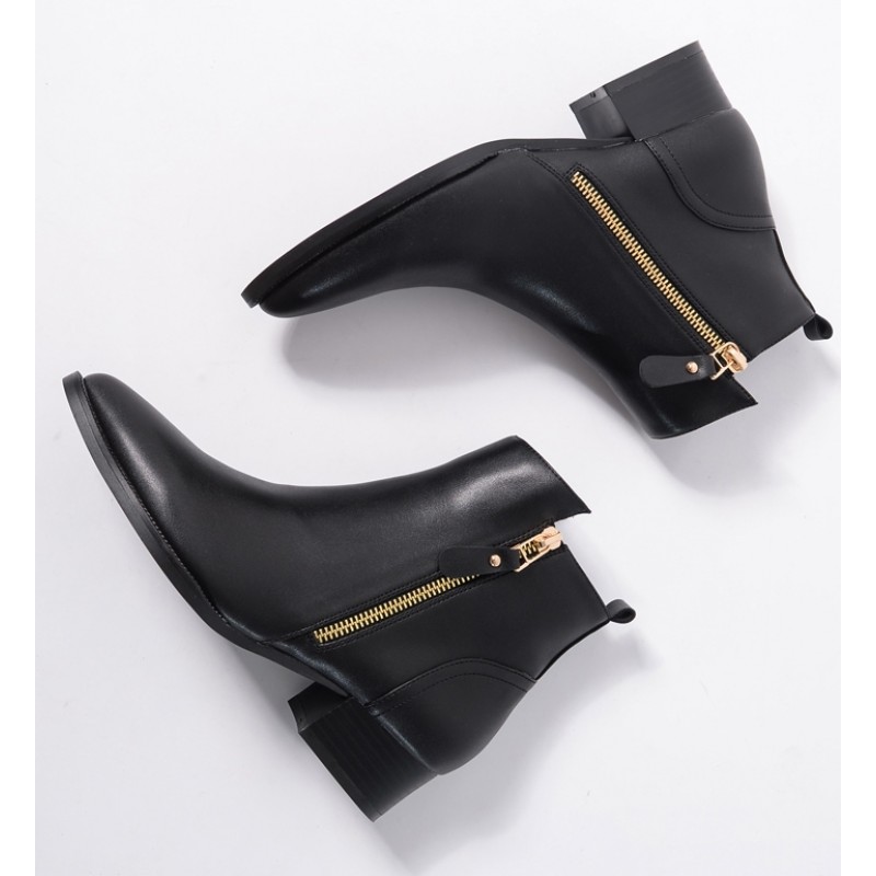 black boots with gold zipper